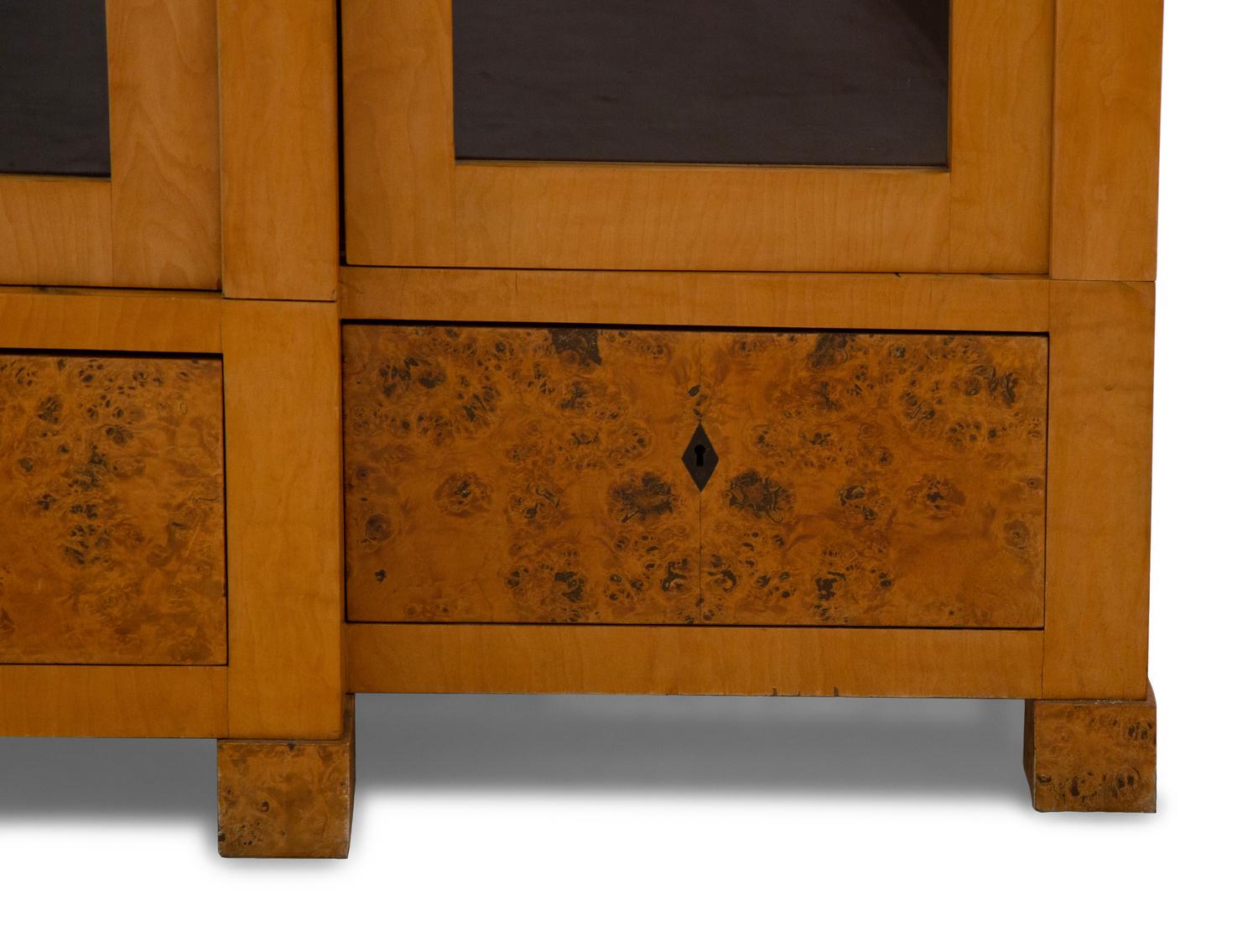 A German Neoclassical Birch Breakfront Bookcase