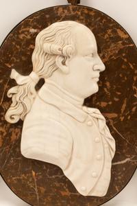 A Set of Four Iron-Framed Marble Portrait Medallions