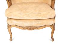 A Pair of Louis XV Style Giltwood Bergères a Oreilles — 19TH CENTURY