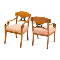 A Pair of Biedermeier Part Ebonized Birch Armchairs