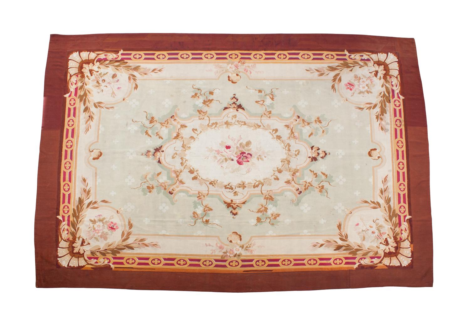 An Aubusson Tapestry Rug 13 feet x 5 feet 4 inches. — MID 19TH CENTURY