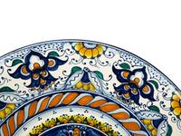 Two Continental Majolica Chargers — 20TH CENTURY