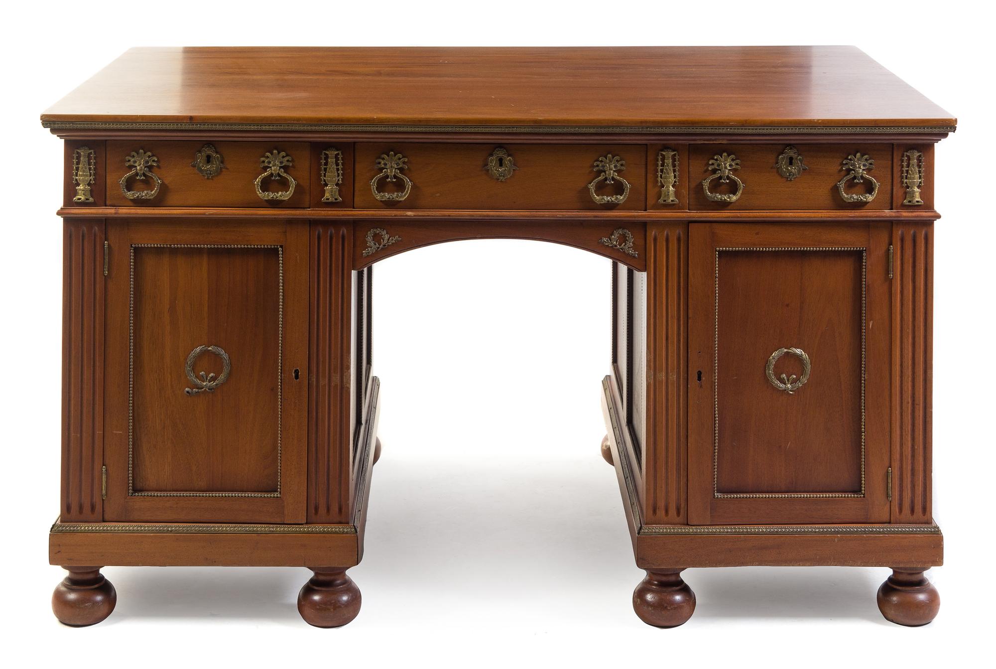 An Empire Style Brass Mounted Pedestal Desk Height 34 x width 55 x depth 34 1/2 inches. — 20TH CENTURY