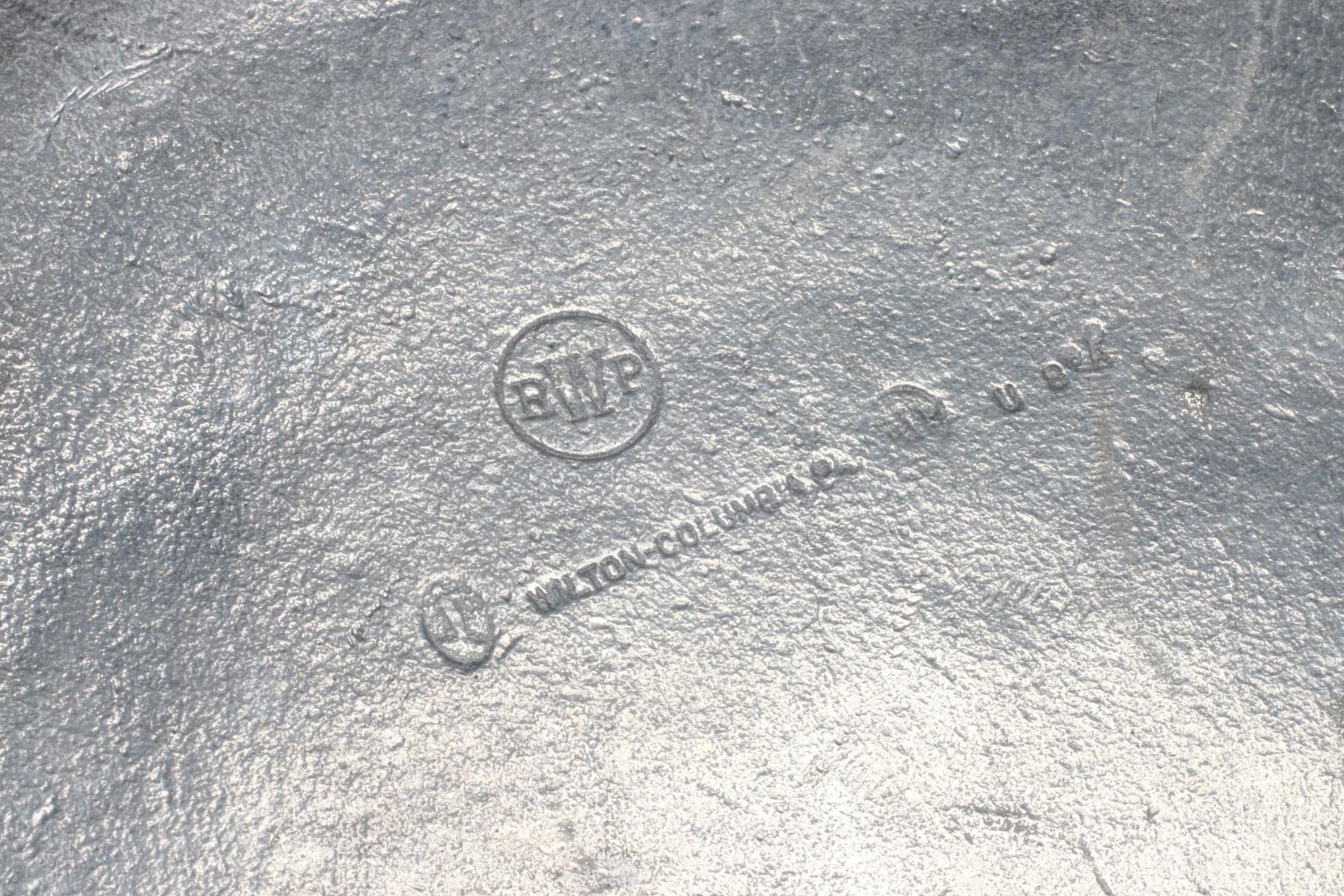 A Group of Twelve Pewter Scalloped Plates
