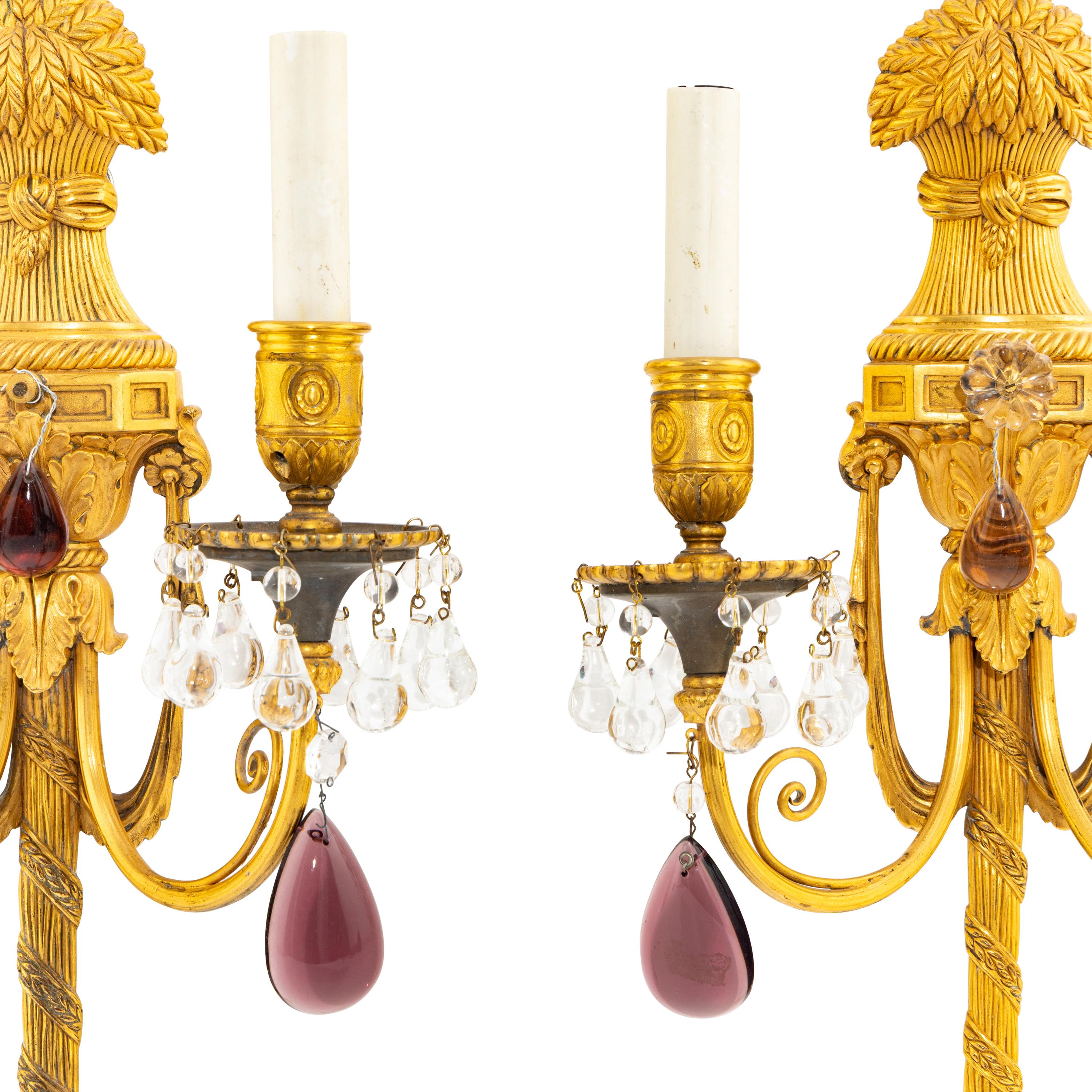 A Pair of French Gilt Bronze and Glass Two Light Sconces