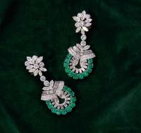 A Pair of 14K White Gold, Emerald, and Diamond Earrings