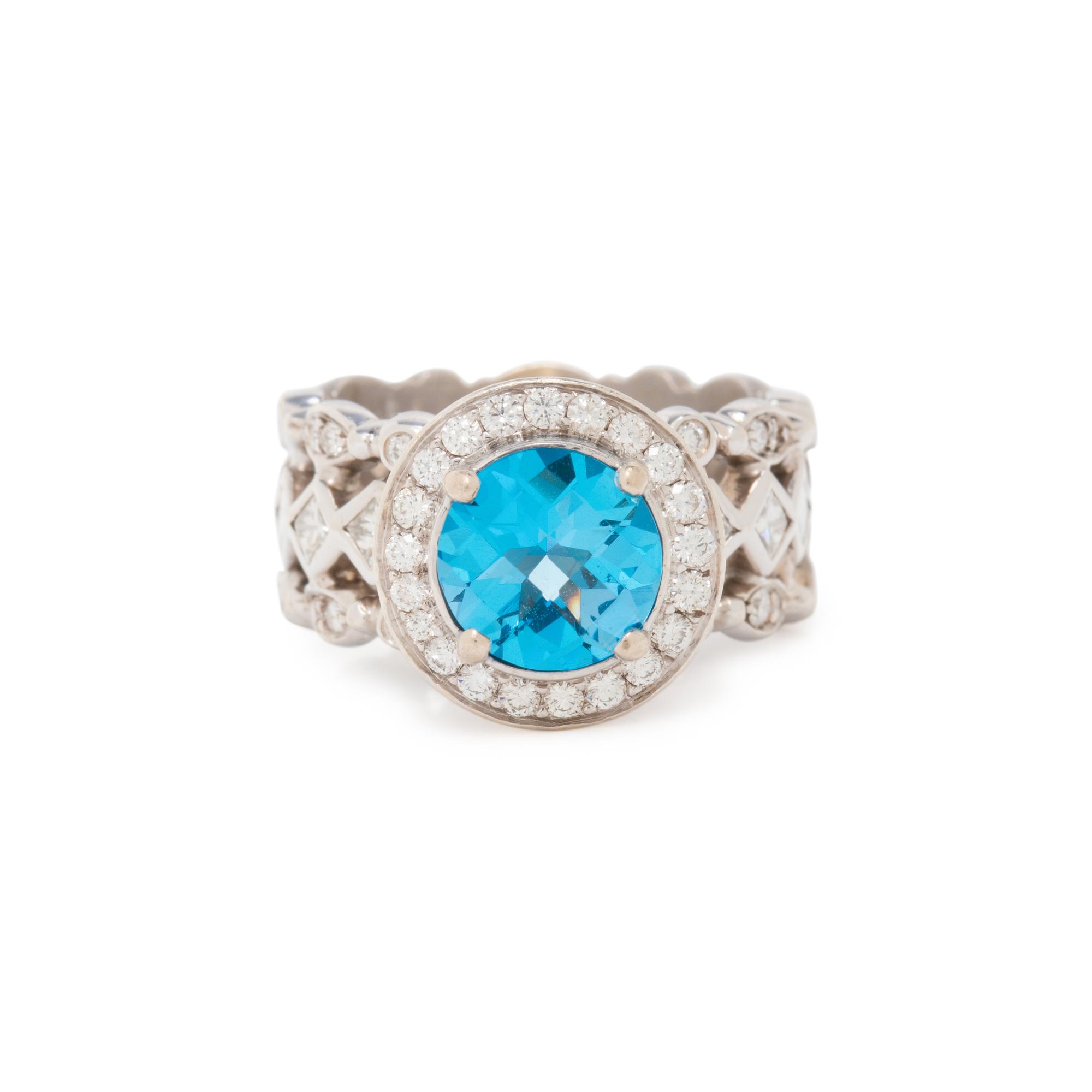 DORIS PANOS, BLUE TOPAZ AND DIAMOND RING