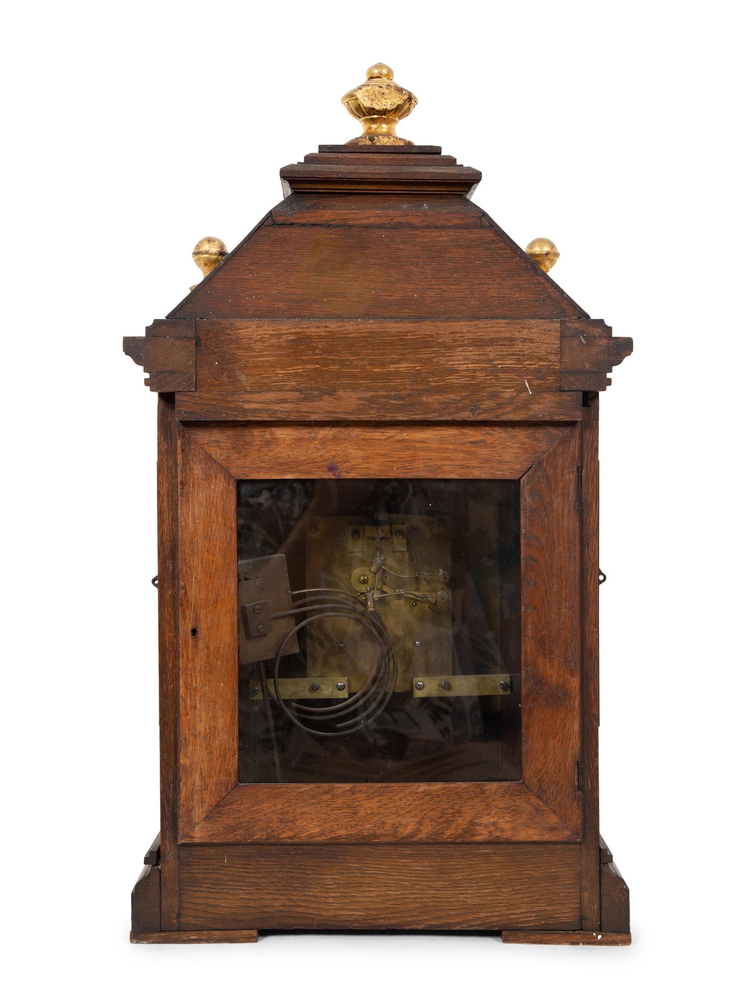 A Victorian Gilt Metal Mounted Oak Bracket Clock