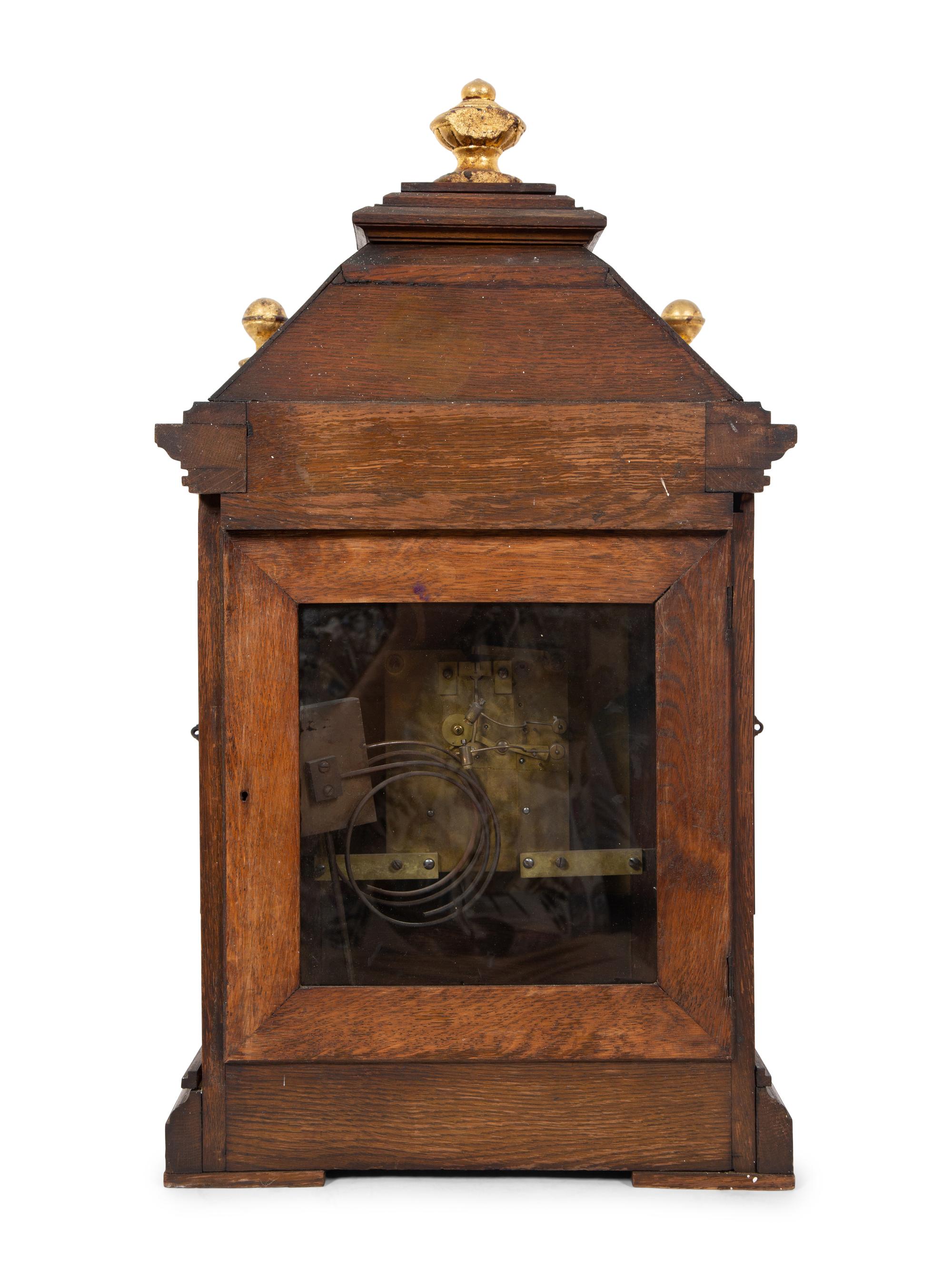 A Victorian Gilt Metal Mounted Oak Bracket Clock