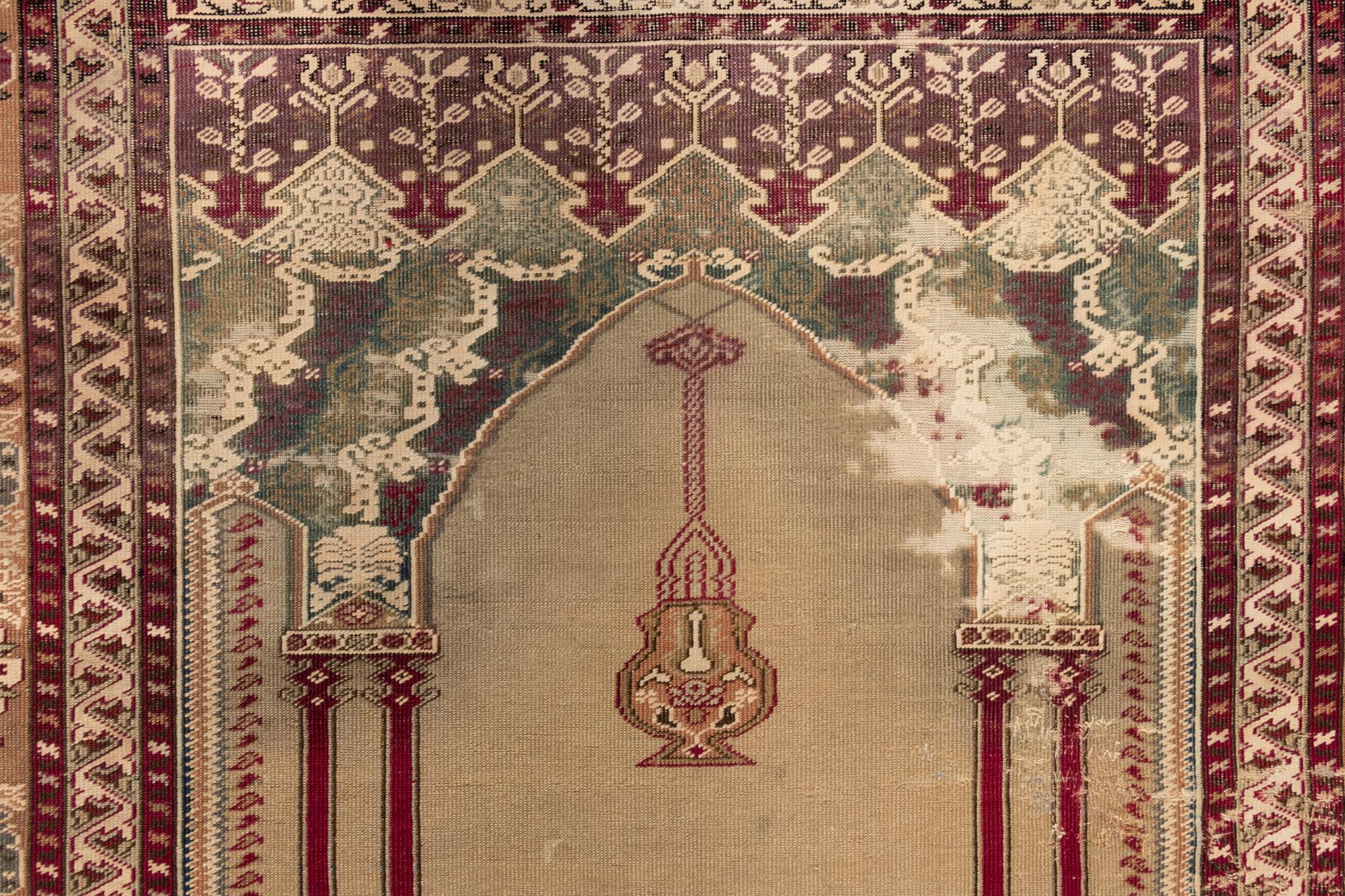 A Persian Wool Prayer Rug
