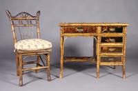 A Victorian Bamboo and Lacquered Desk, Height 28 1/2 inches.