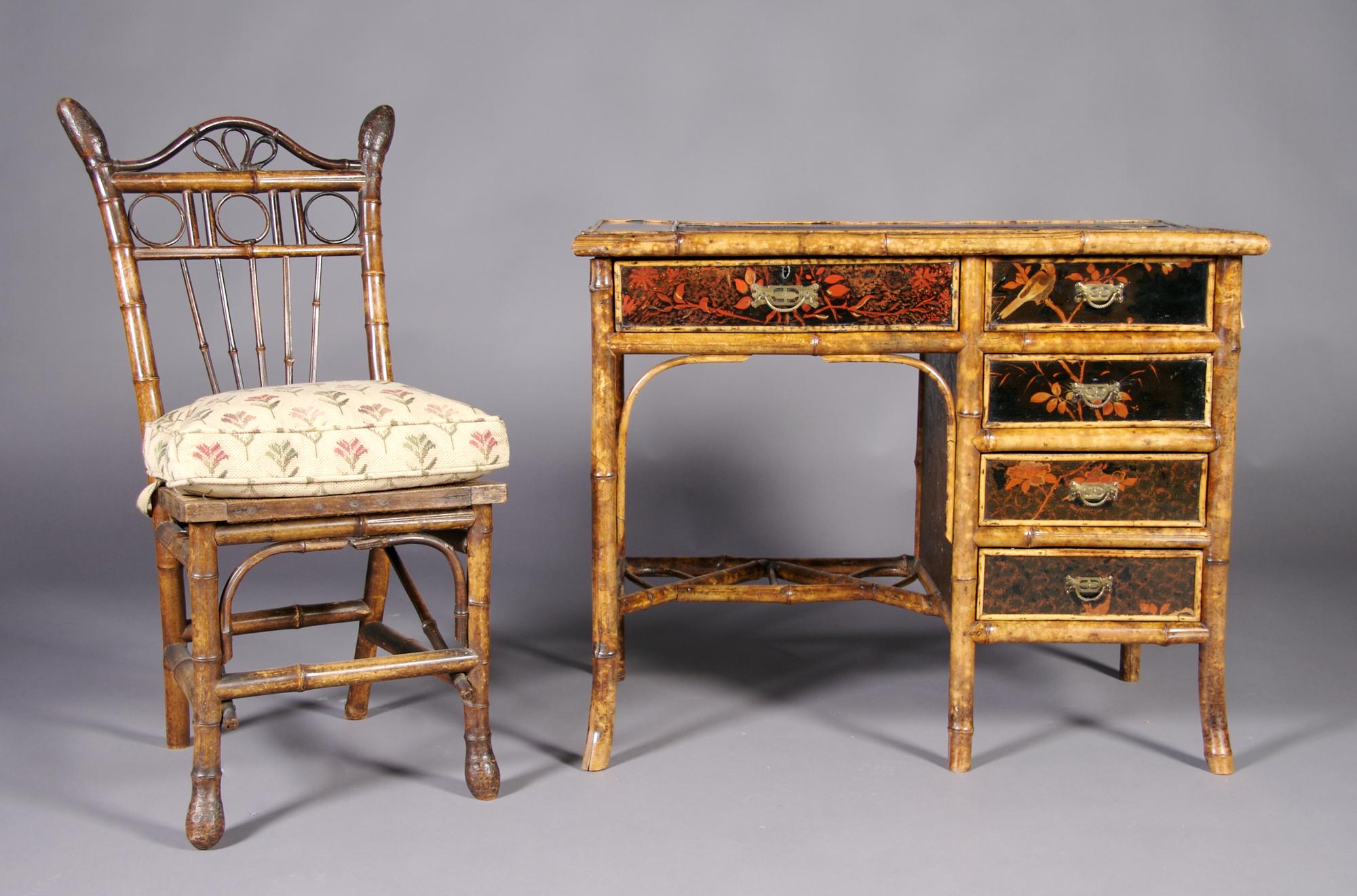 A Victorian Bamboo and Lacquered Desk, Height 28 1/2 inches.