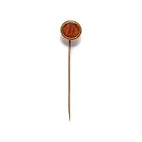 A Roman Carnelian Intaglio with Two Erotes Flanking a Tropaion — Set in a 19th century gold pin