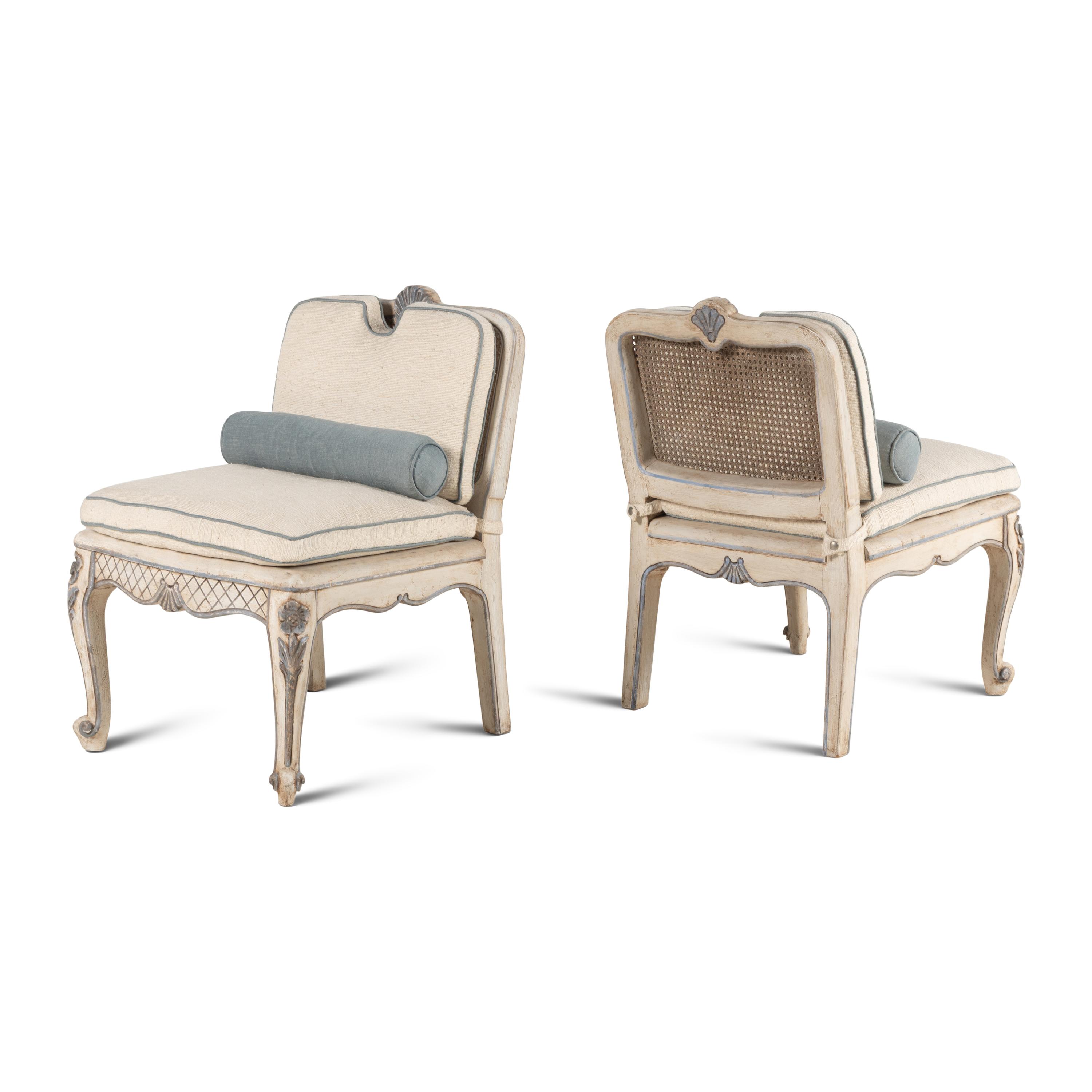 A Pair of Italian Painted and Caned Side Chairs