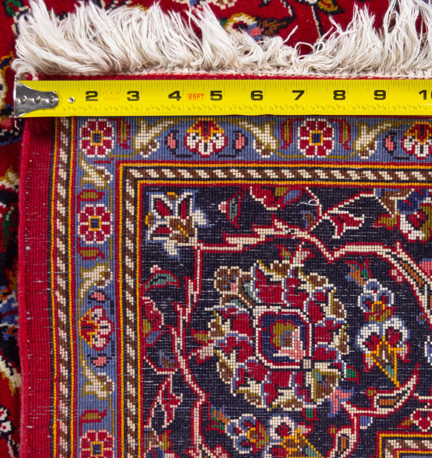 A Kashan Wool Rug