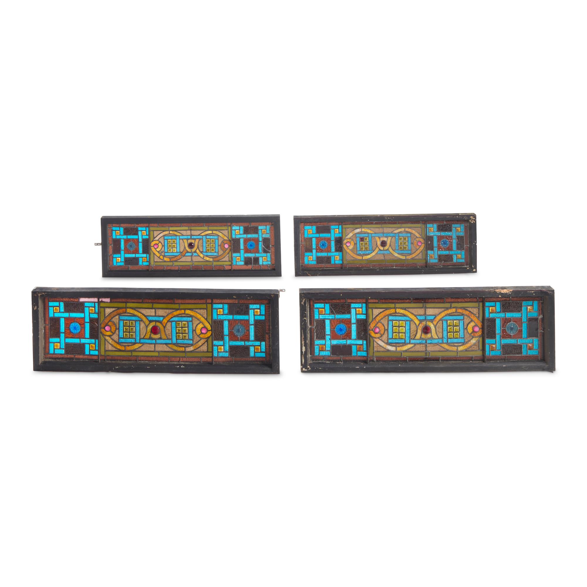 A Group of Four Stained Glass Window Panels