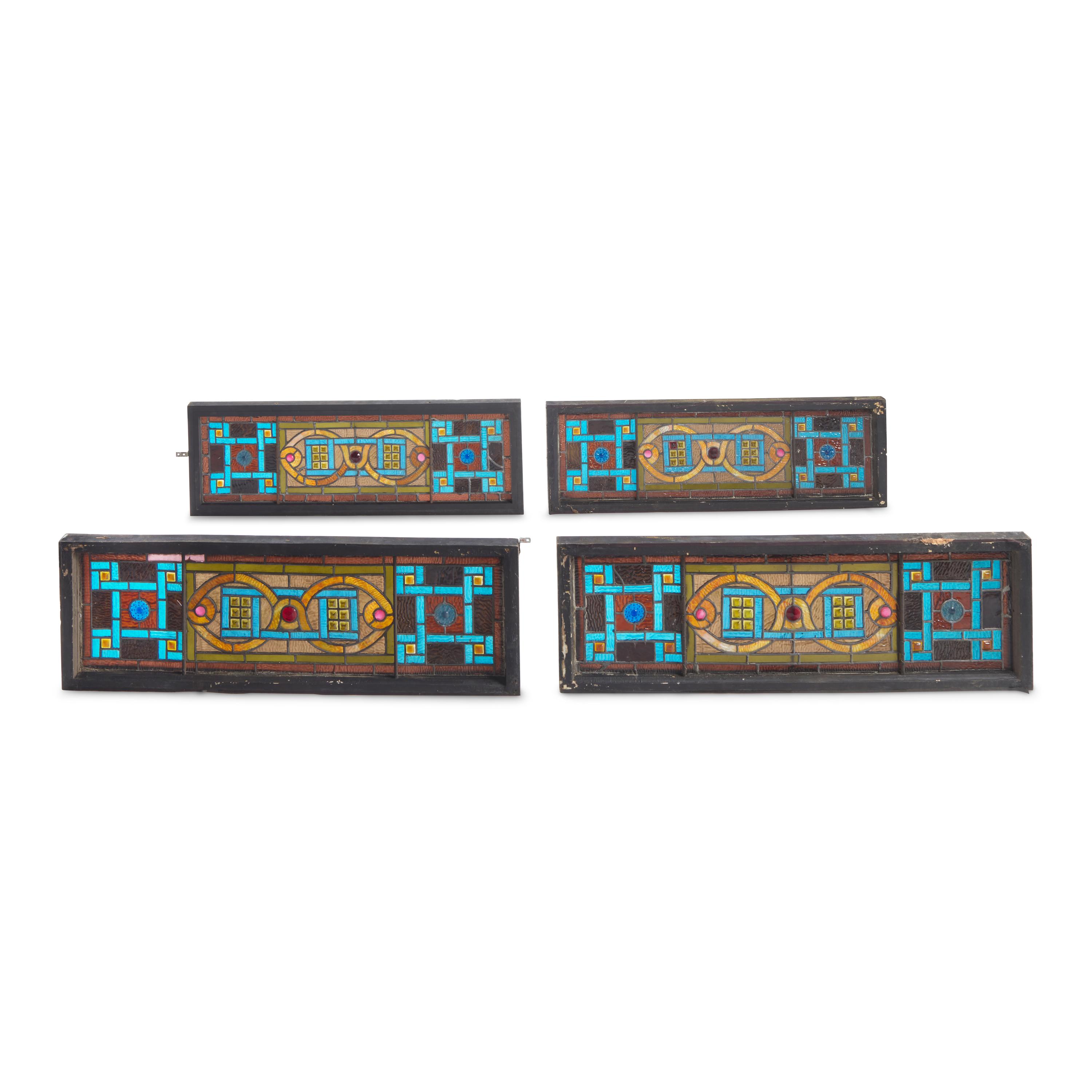 A Group of Four Stained Glass Window Panels