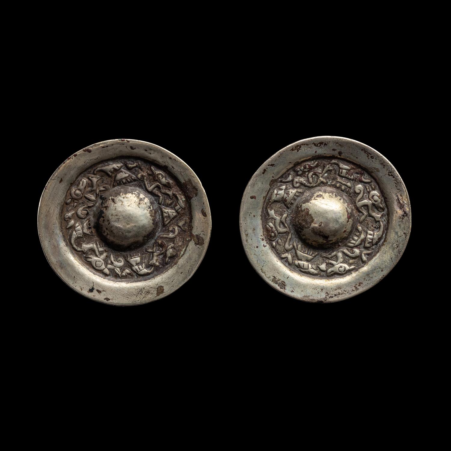 A Pair of Chimu Silver Ear Spools