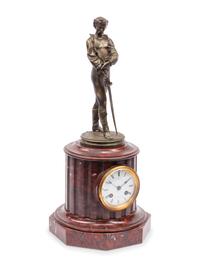 A French Patinated Bronze and Rouge Marble Figural Mantel Clock