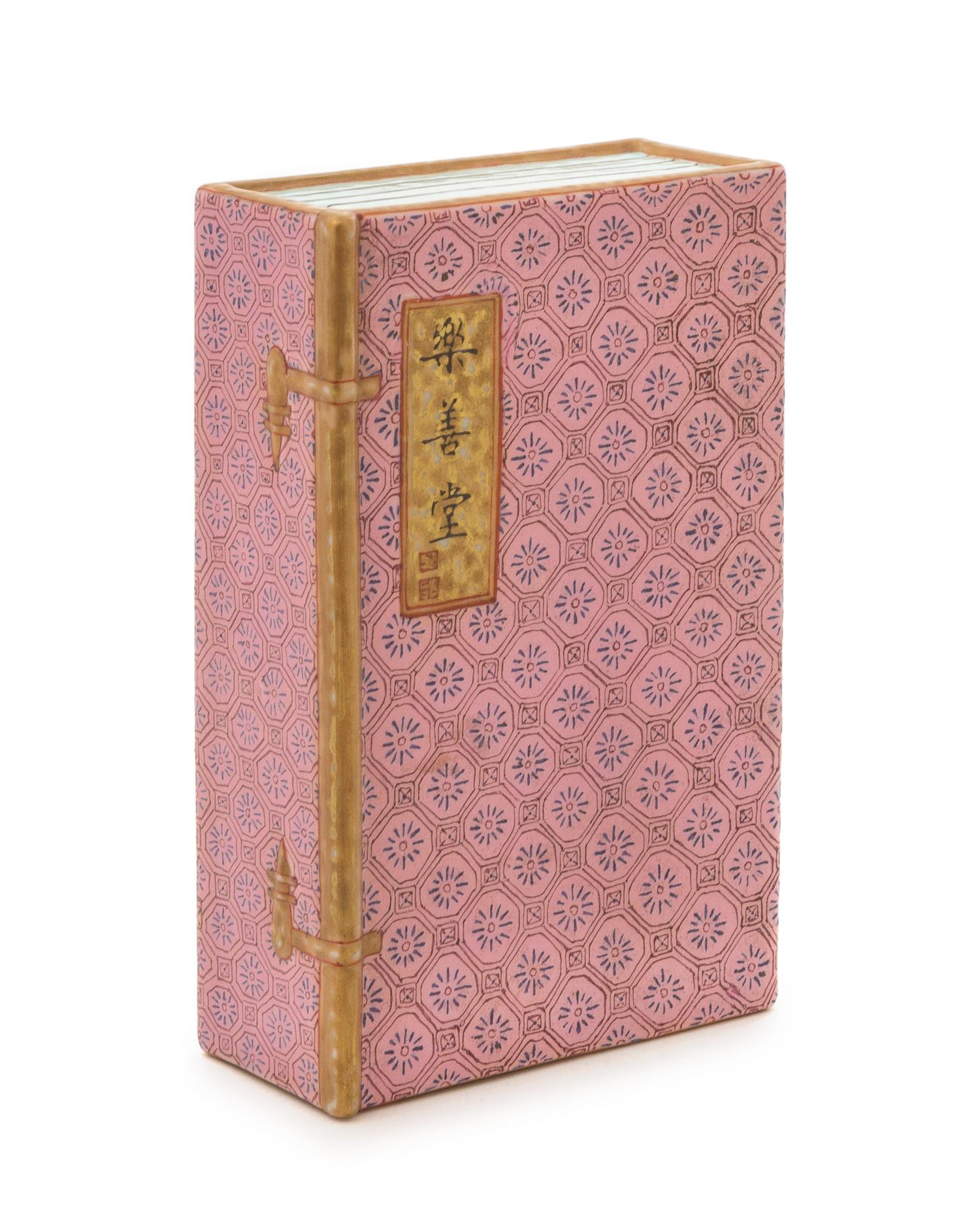 A Famille Rose Porcelain Book-Form Table Article Length 5 1/4 x width 3 1/2 x depth 1 1/2 inches.