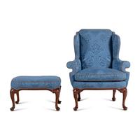 A George I Style Walnut Wingback Armchair and Ottoman
