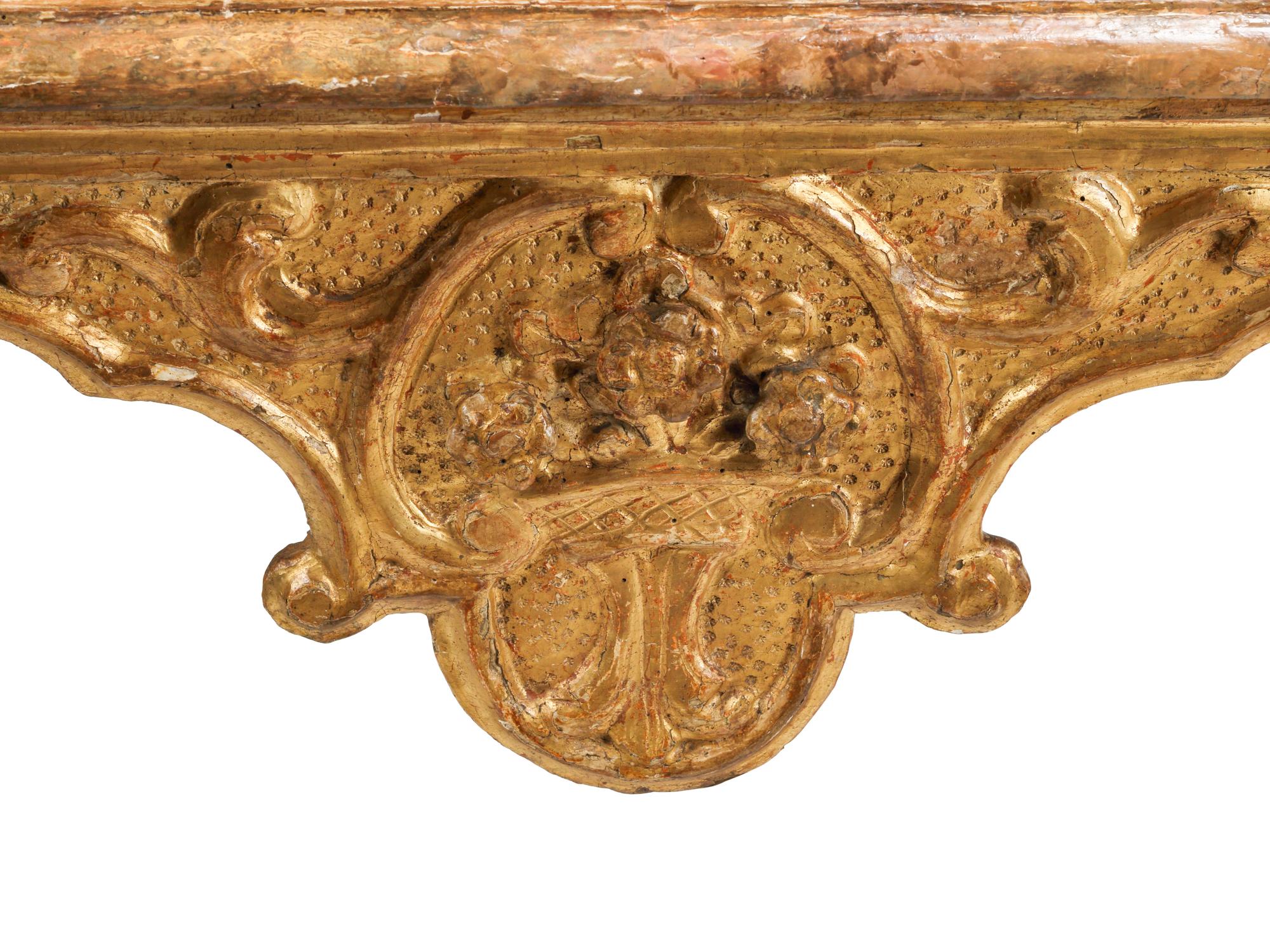 A Pair of Italian Baroque Carved Giltwood Console Tables