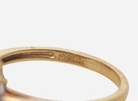 A Collection of Assorted Gold and Gemstone Rings