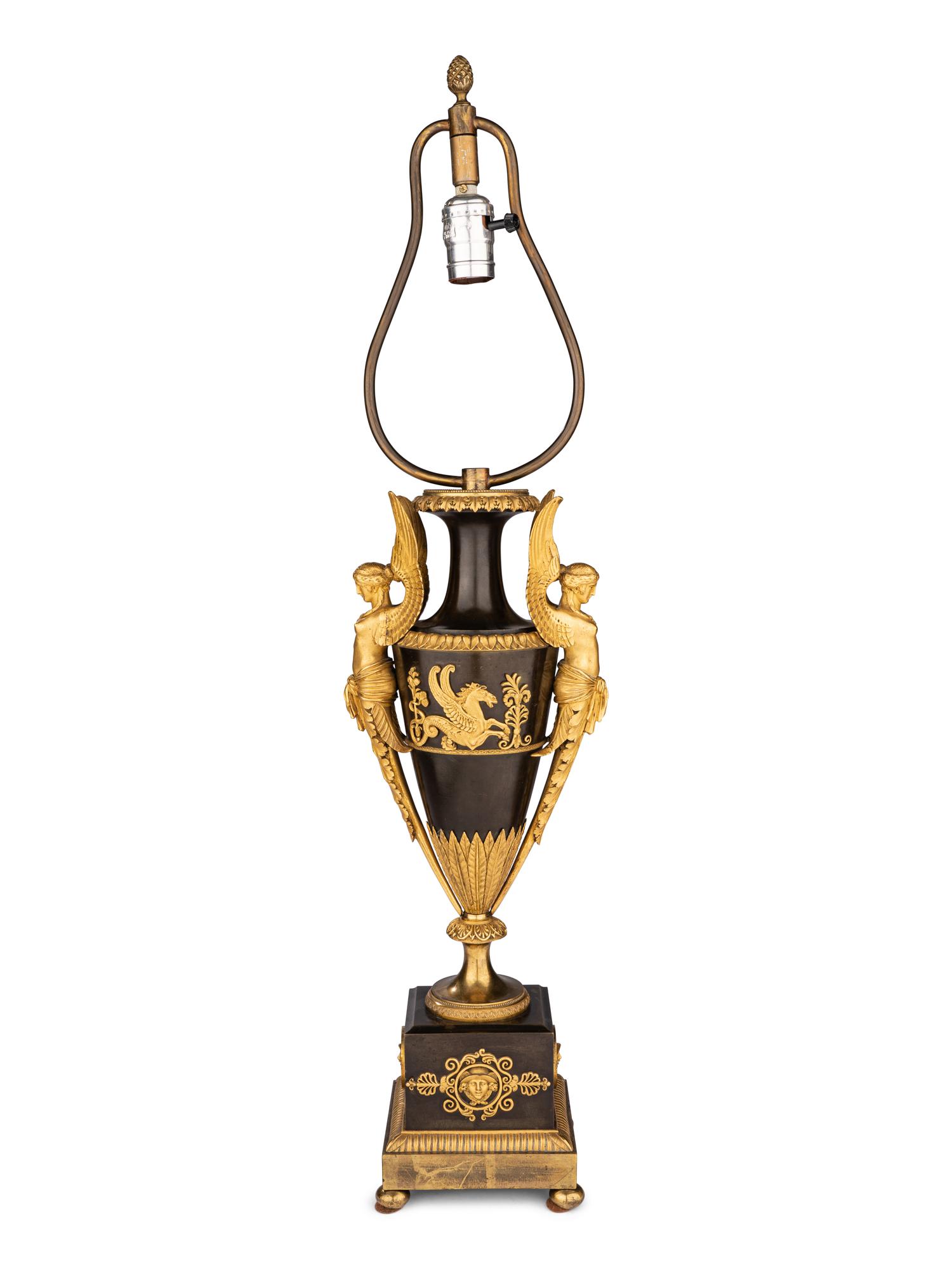 A Pair of Directoire Ormolu and Patinated Bronze Urns