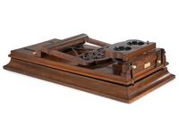 [EARLY PHOTOGRAPHY]. Table top folding stereographoscope. New York: E. & H.T. Anthony & Co.