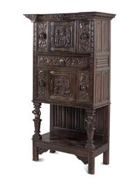A Renaissance Style Carved Oak Cabinet