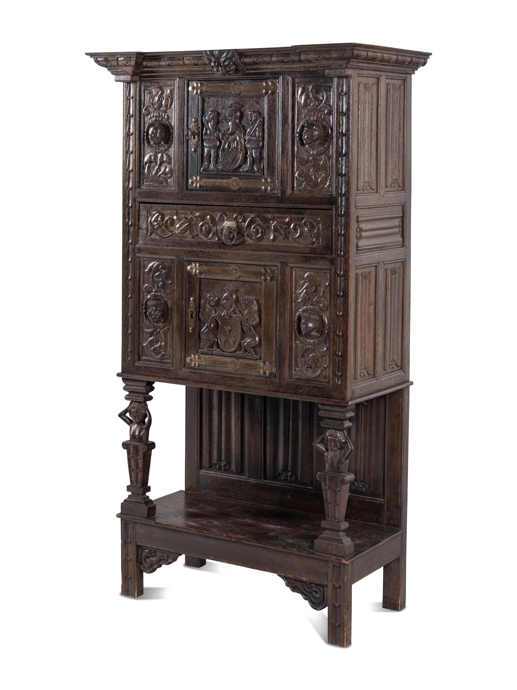 A Renaissance Style Carved Oak Cabinet