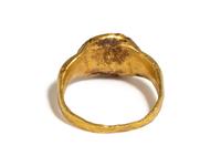 A Roman Gold and Agate Finger Ring with a Nude Male Athlete