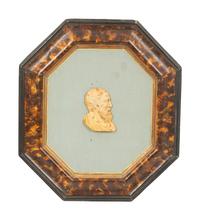 A Pair of Continental Faux Tortoiseshell Painted Framed Composition Plaques of Profile Busts