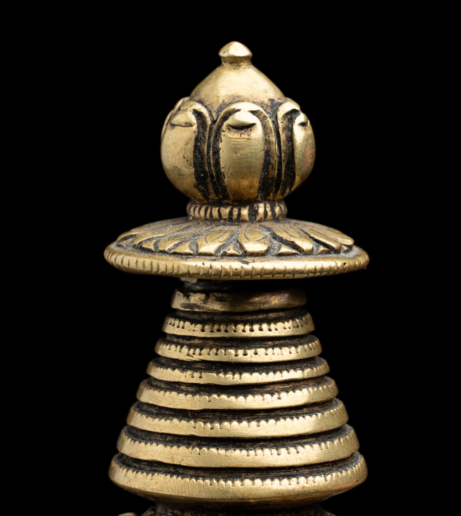 A Small Tibetan Bronze Pala-Style Model of a Stupa