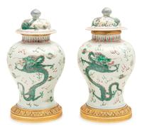 A Pair of Gilt Bronze Mounted Wucai Porcelain Baluster Jars and Covers