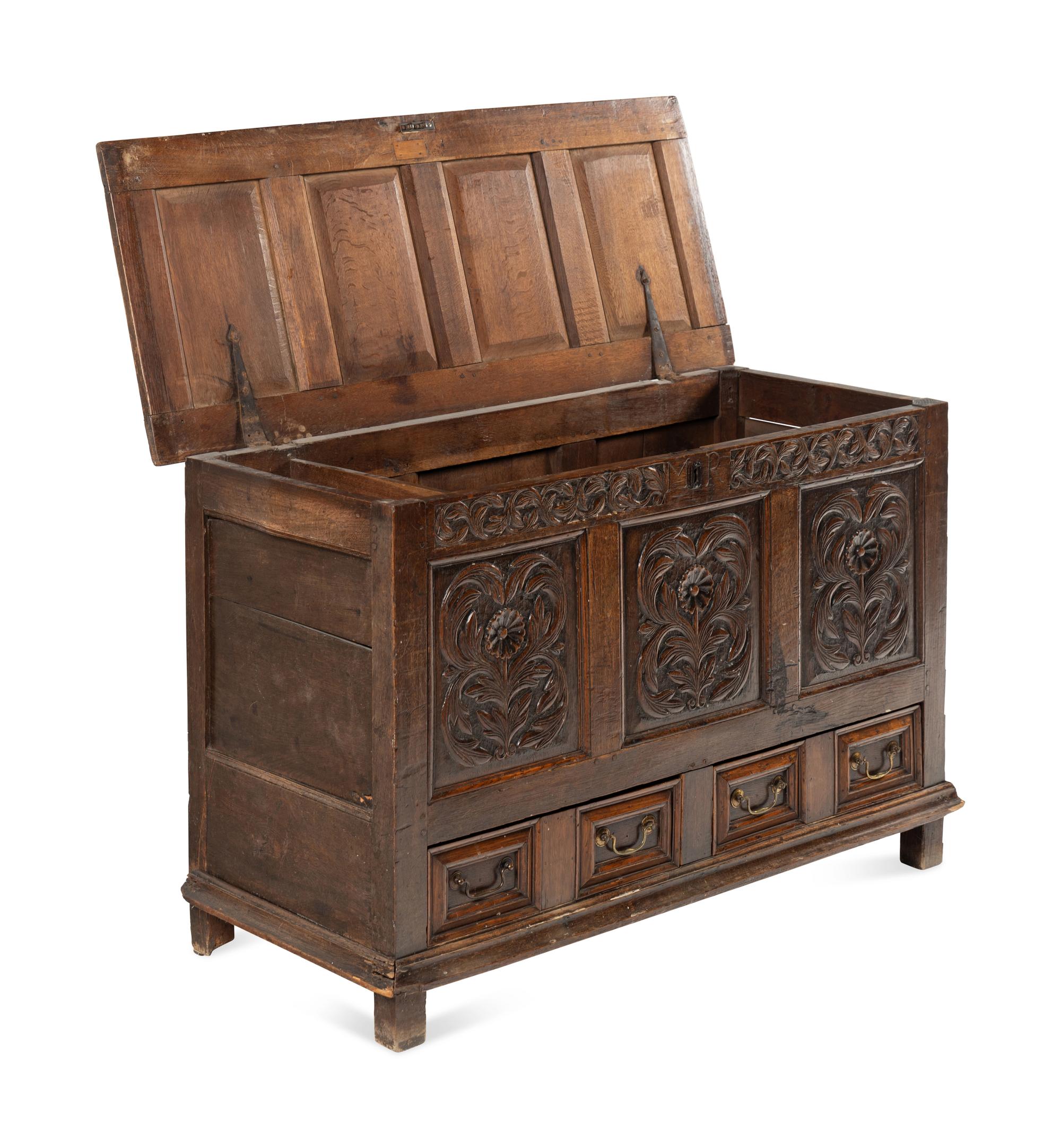 A Jacobean Carved Oak Two-Drawer Mule Chest