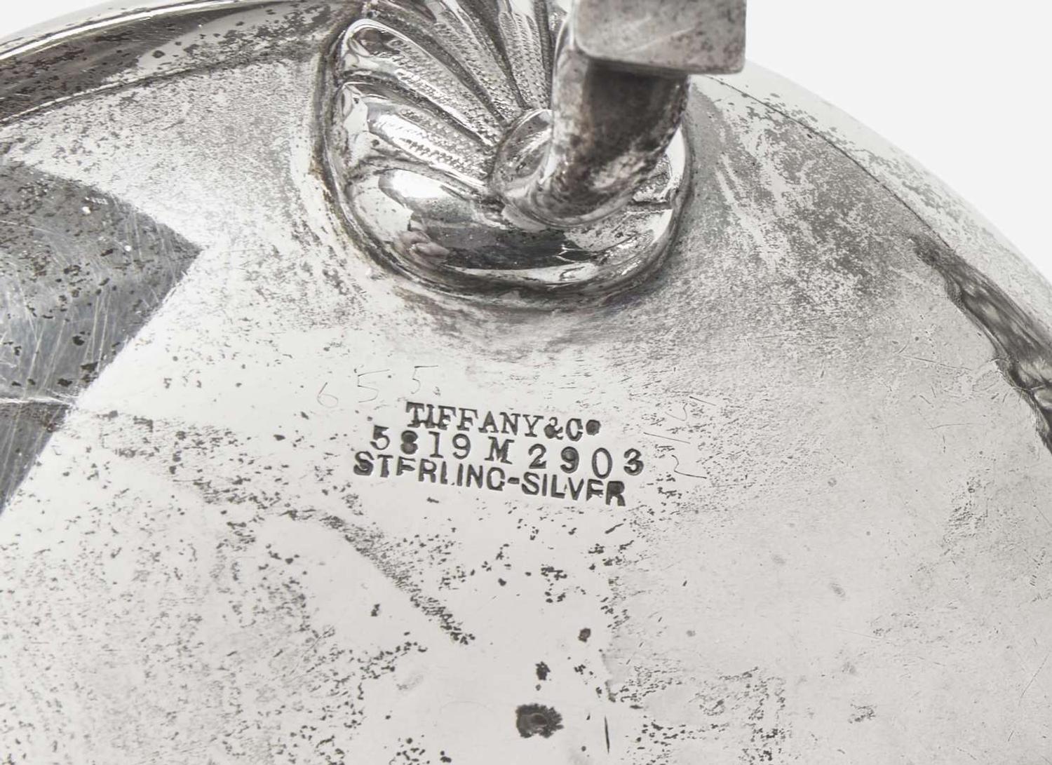An assembled group of eight sterling silver floral cast and repoussé items, Tiffany & Co., New York, NY, dates ranging 1873-1902