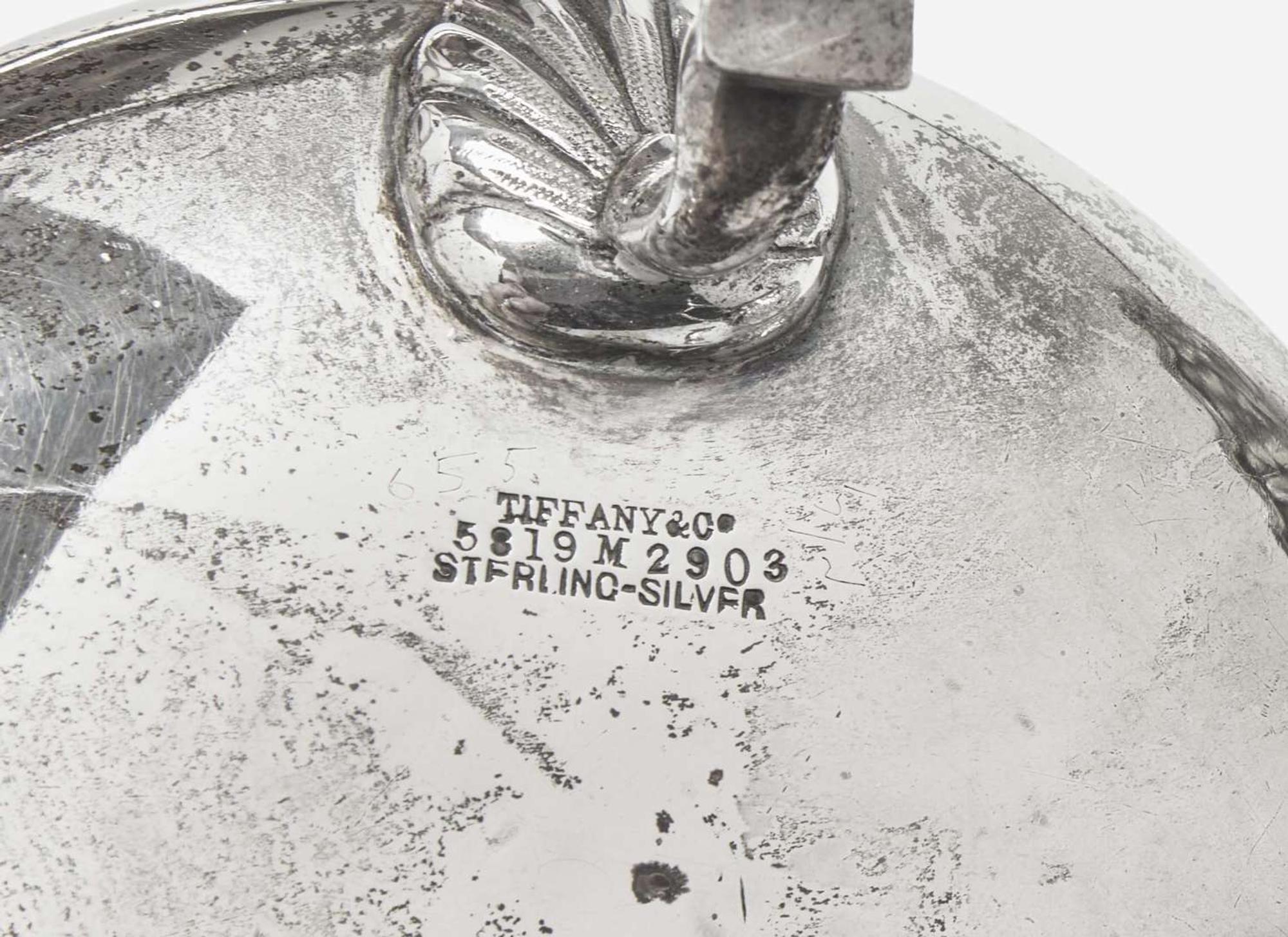 An assembled group of eight sterling silver floral cast and repoussé items, Tiffany & Co., New York, NY, dates ranging 1873-1902