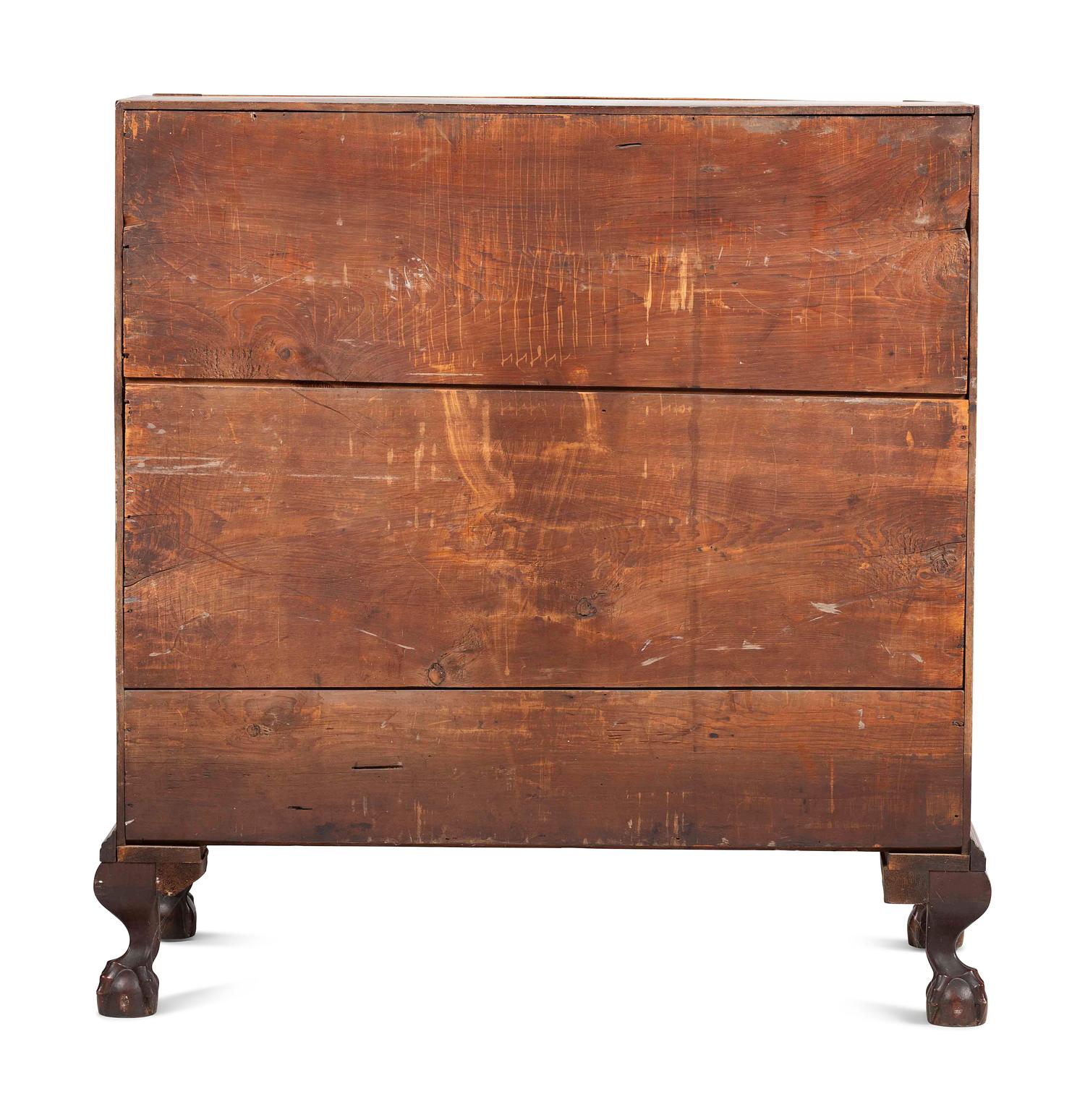 A Chippendale Carved and Figured Mahogany Reverse-Serpentine Claw-and-Ball Foot Slant-Front Desk