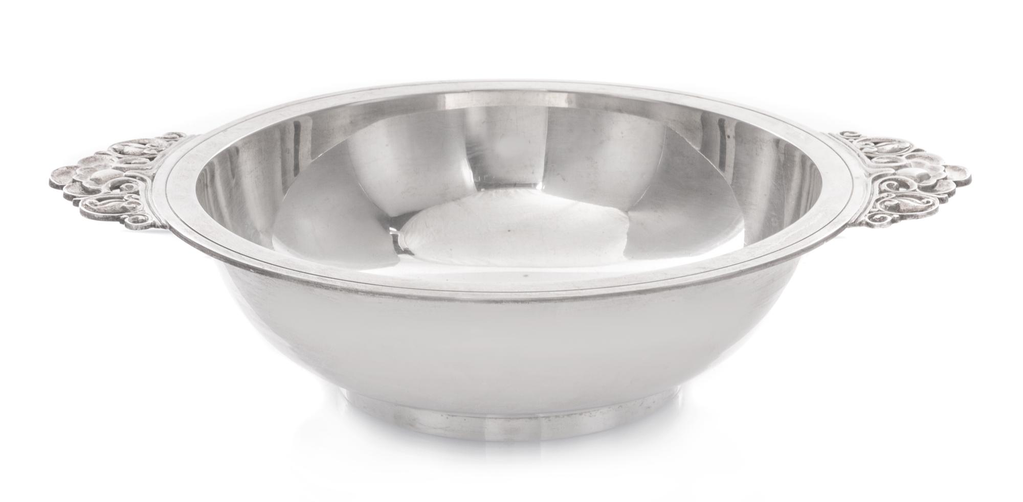 An American Silver Two-Handled Bowl, Tiffany & Co., New York, NY, 1940, of circular form, the rim having applied flat handles cast with