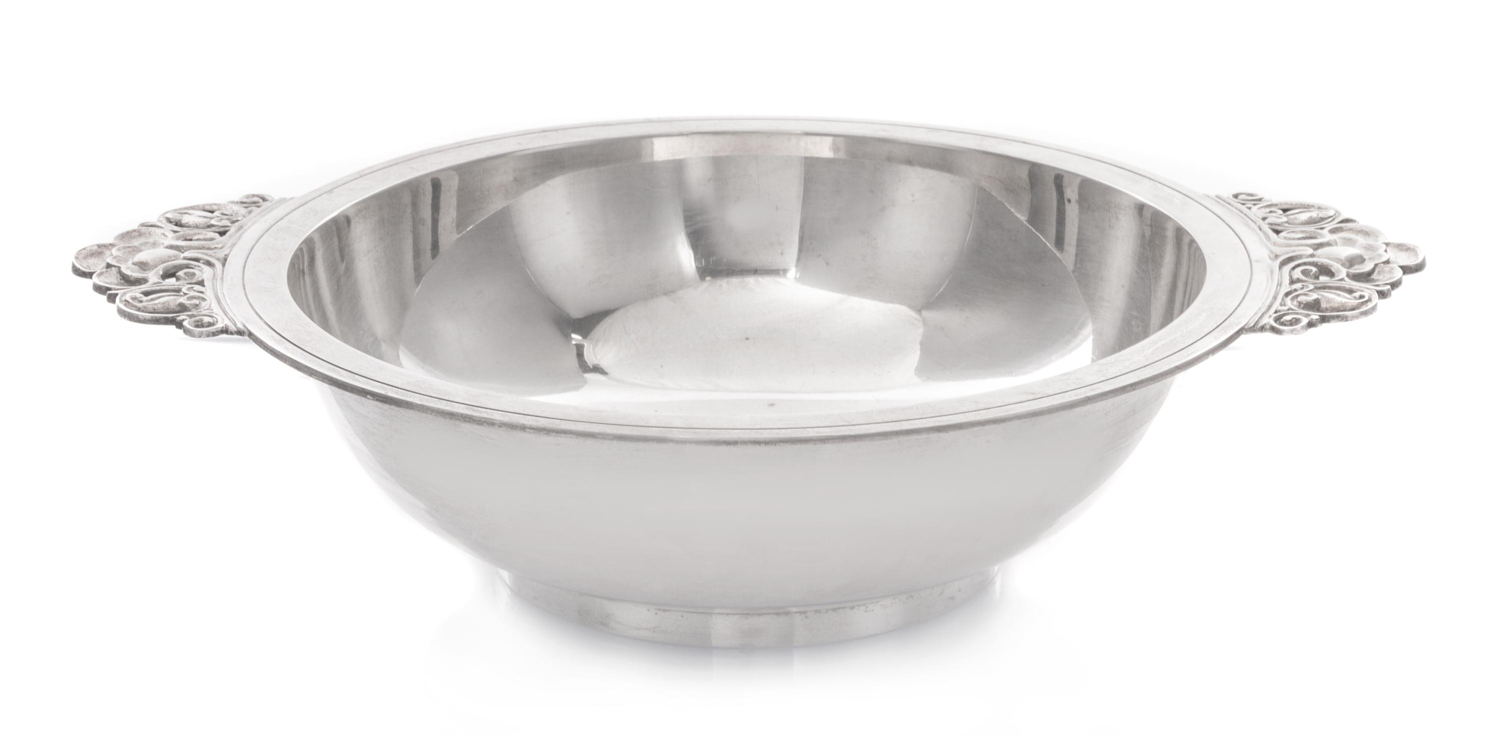 An American Silver Two-Handled Bowl, Tiffany & Co., New York, NY, 1940, of circular form, the rim having applied flat handles cast with