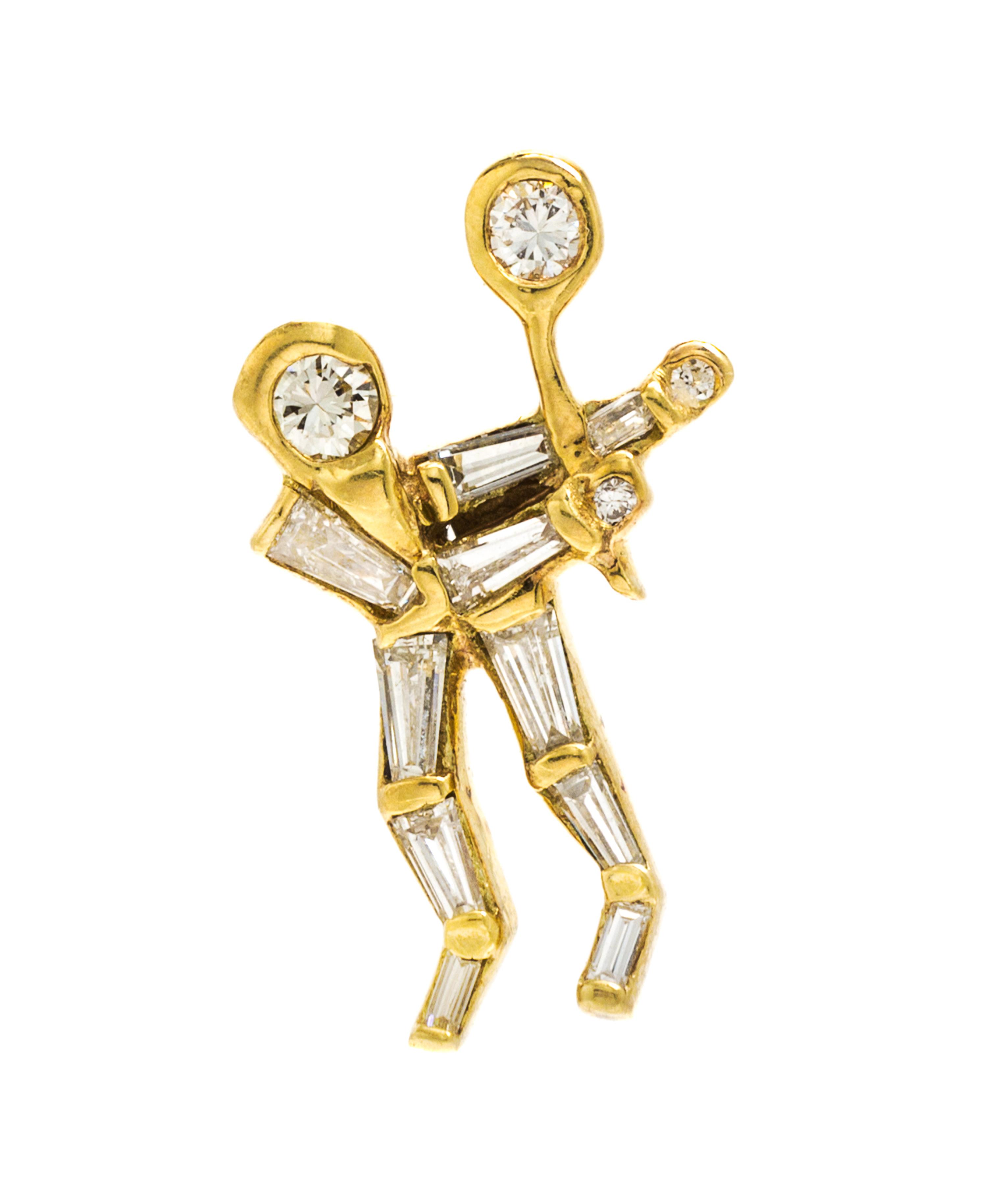 A 14 Karat Yellow Gold and Diamond Tennis Player Pendant, Jose Hess, 0.80 dwts.