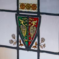 Birds in shield window