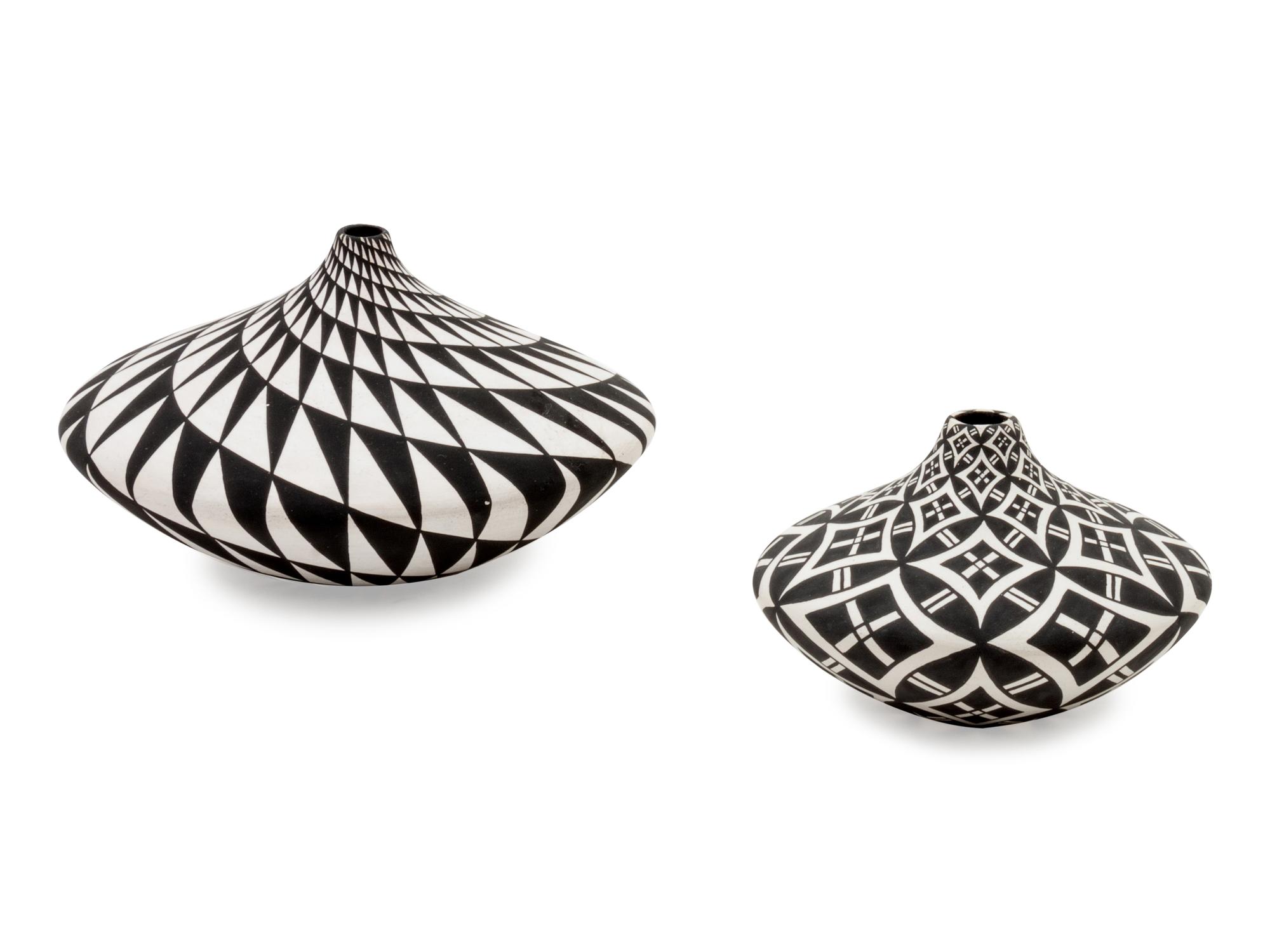Two Black and White Acoma Vessels