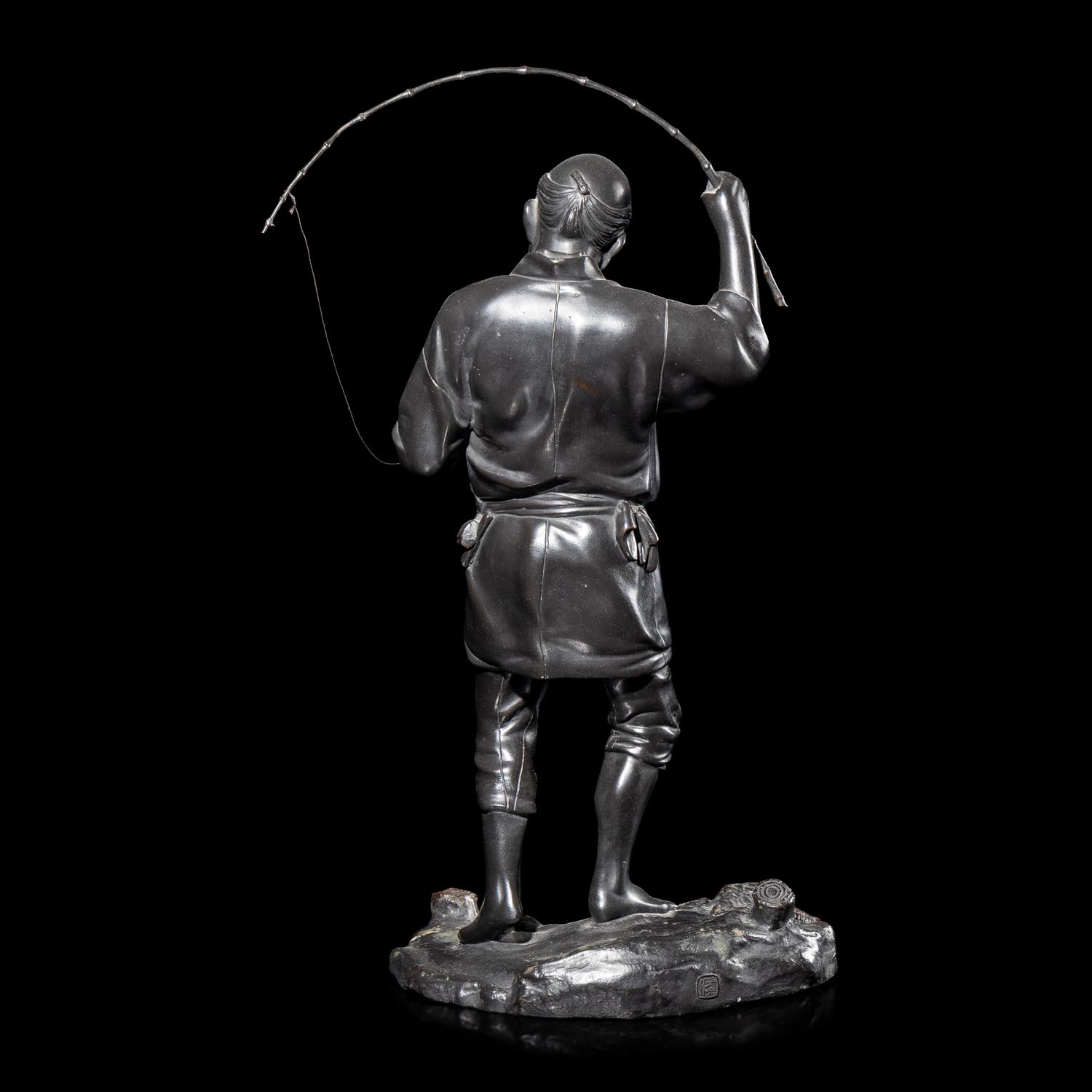 A Japanese Bronze Figure of a Fisherman by Seiko, Meiji/Taisho Period