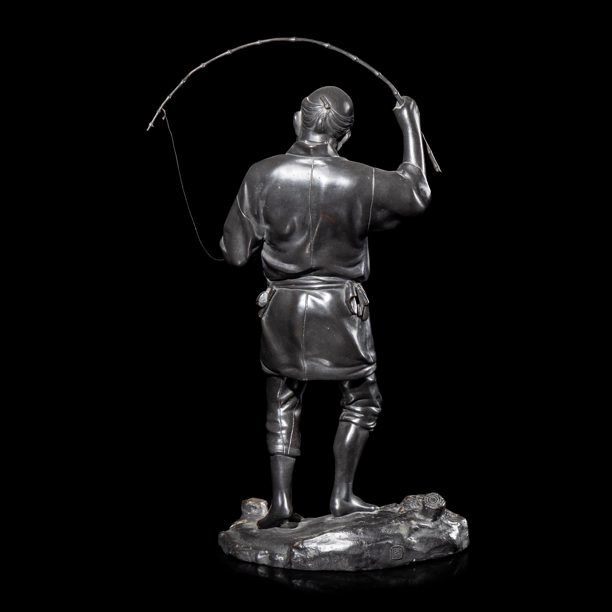 A Japanese Bronze Figure of a Fisherman by Seiko, Meiji/Taisho Period