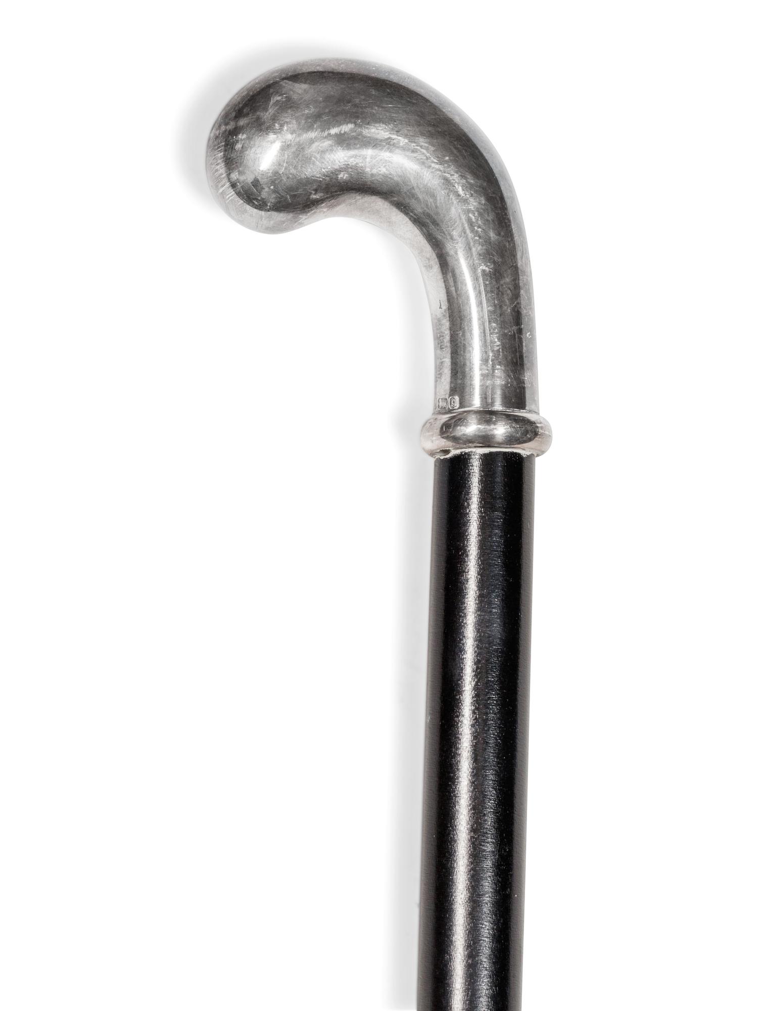An English Silver Mounted and Ebonized Walking Stick