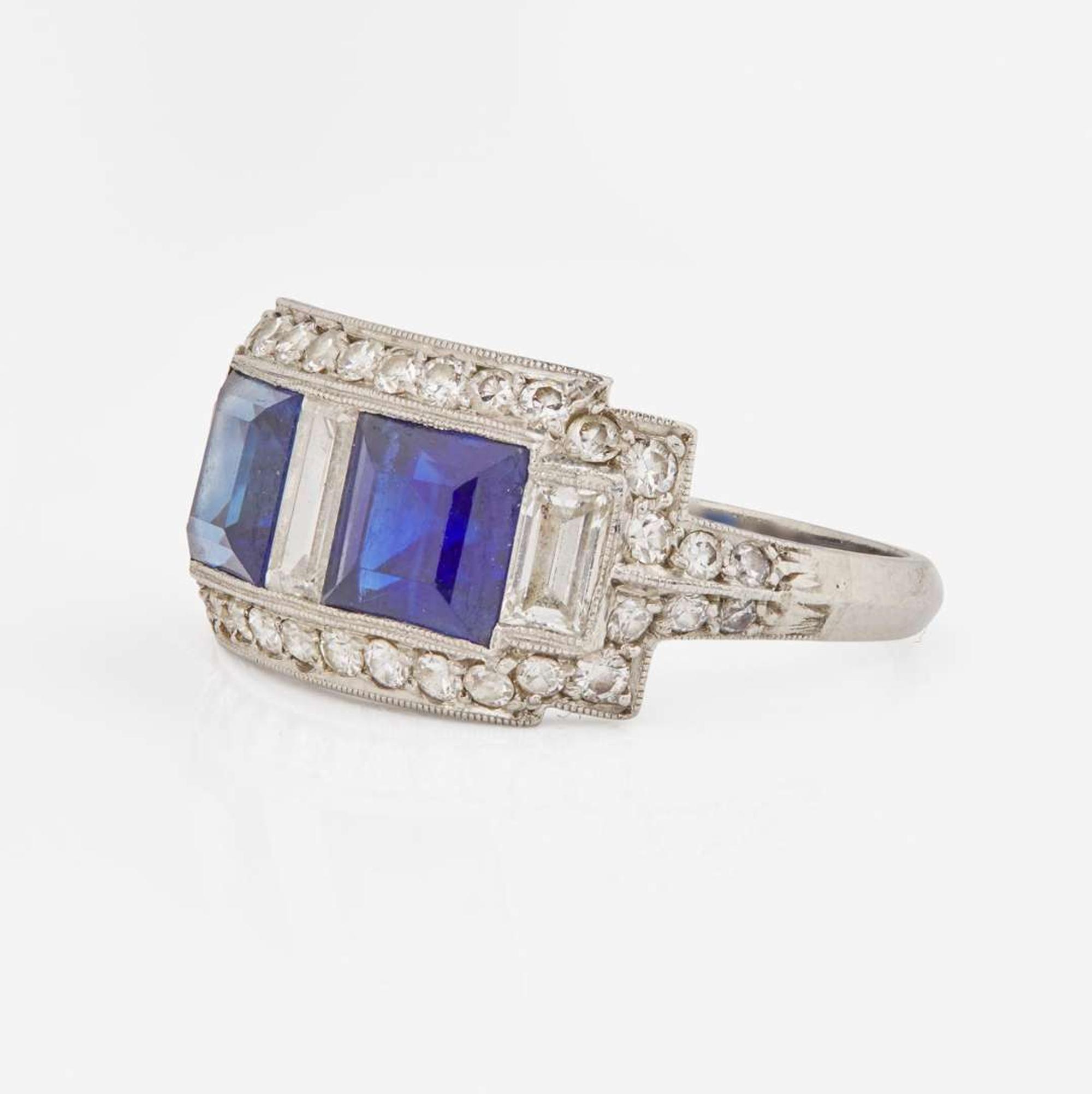 A J.E. Caldwell Platinum, Sapphire, and Diamond Ring