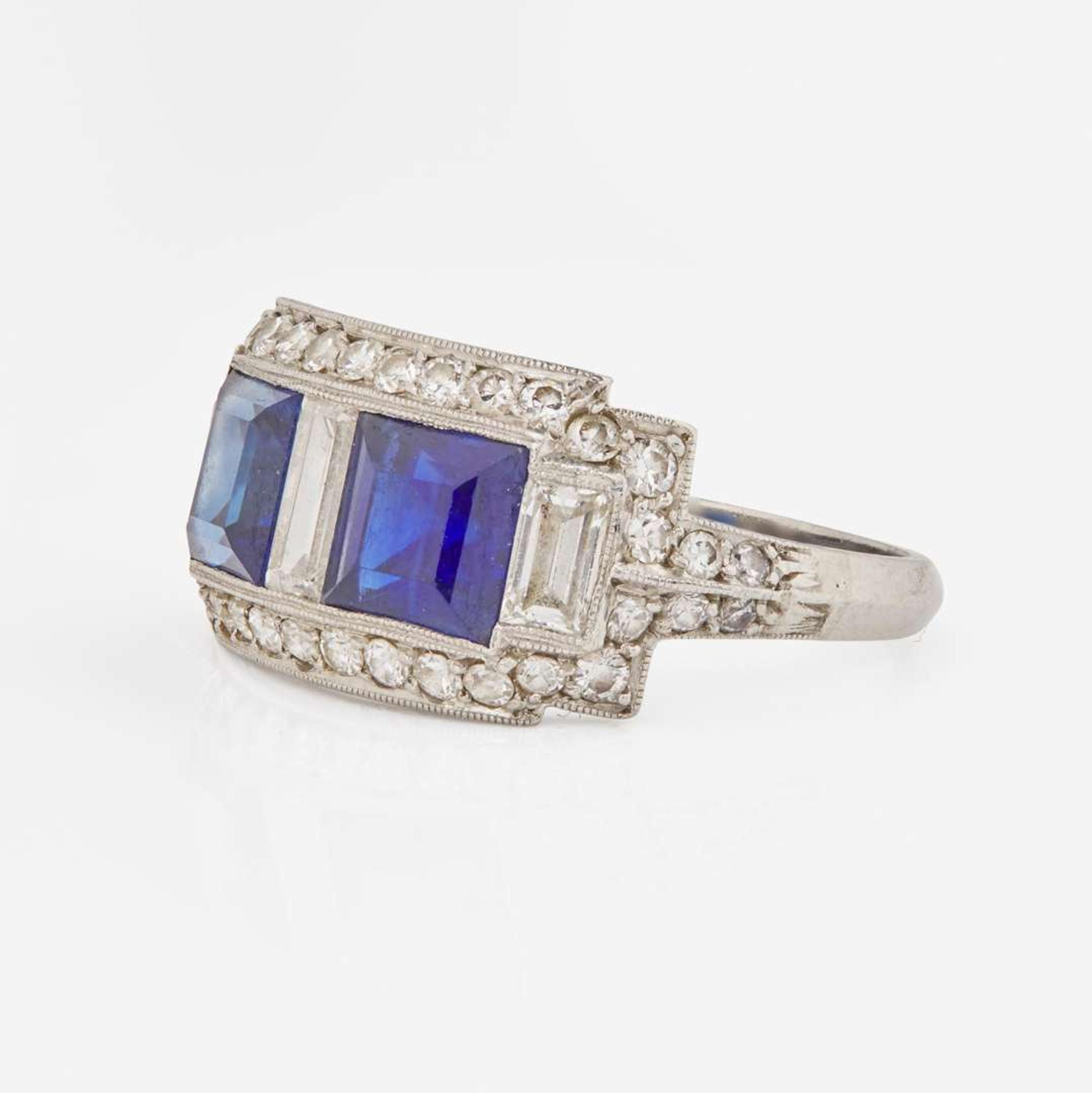 A J.E. Caldwell Platinum, Sapphire, and Diamond Ring