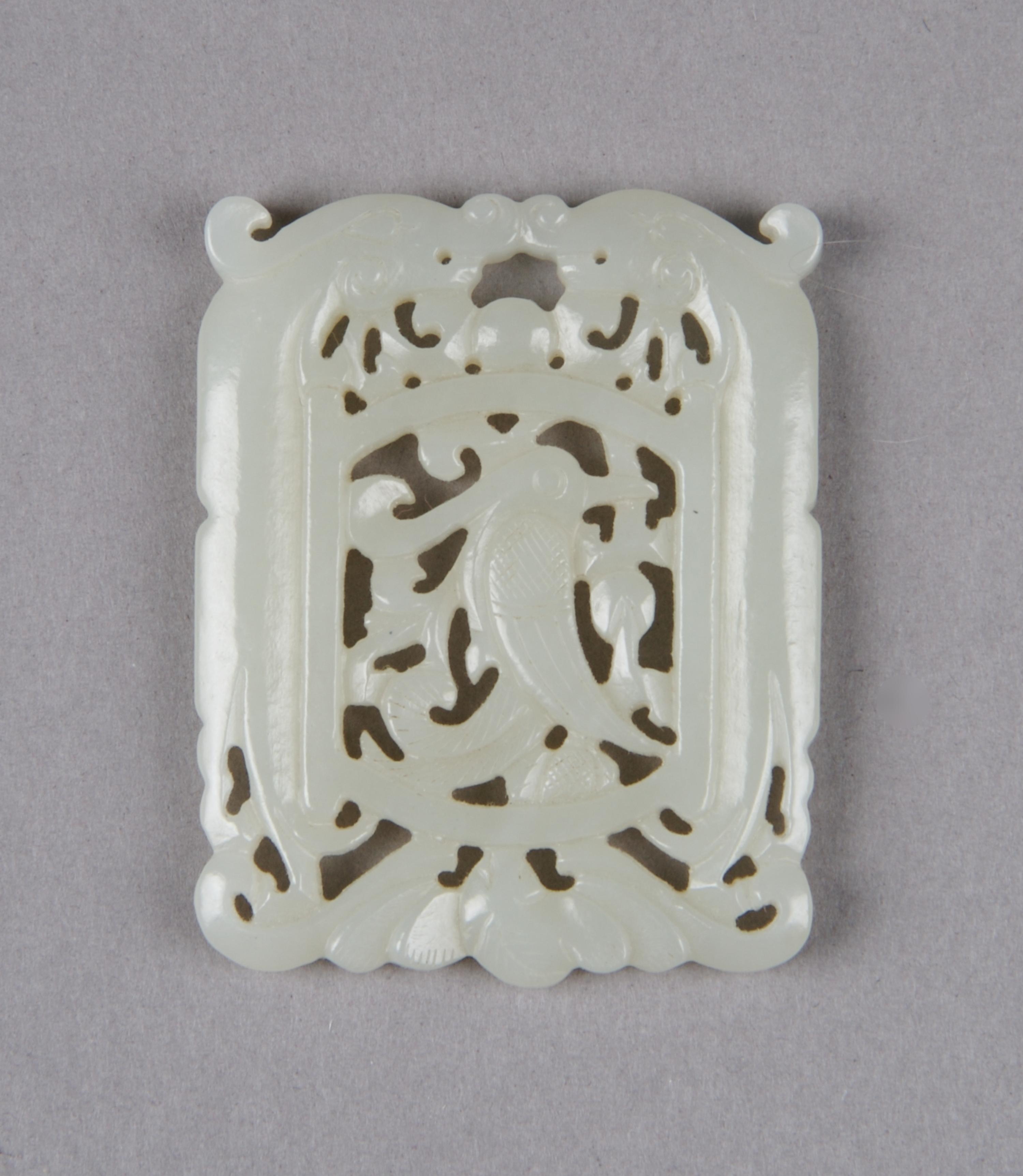 A Chinese Celadon Jade Plaque, Height 2 1/8 inches.